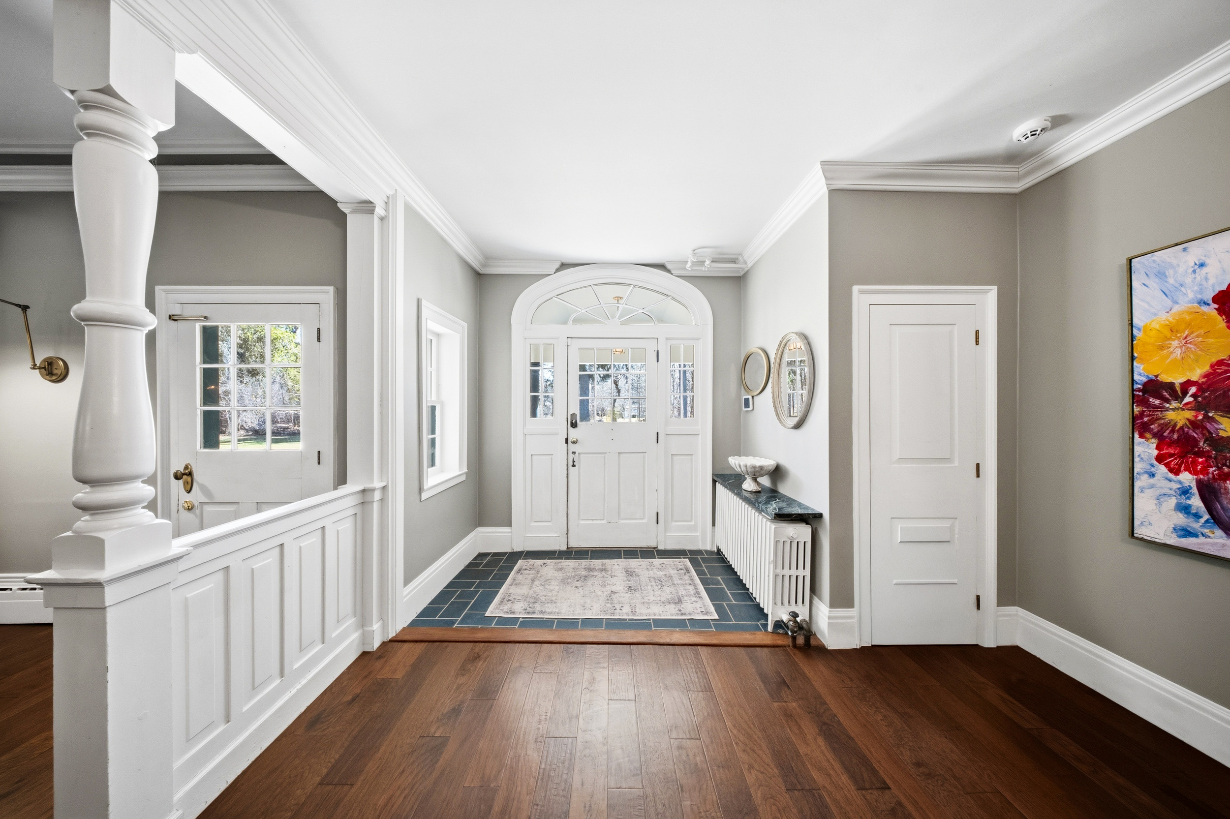 Foyer with arched transom entry at Cedarbrook, The Bowman House, Cambridge